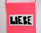 Love banner Valentine's Day with German word for love Liebe in black and hot pink wall hanging home decor