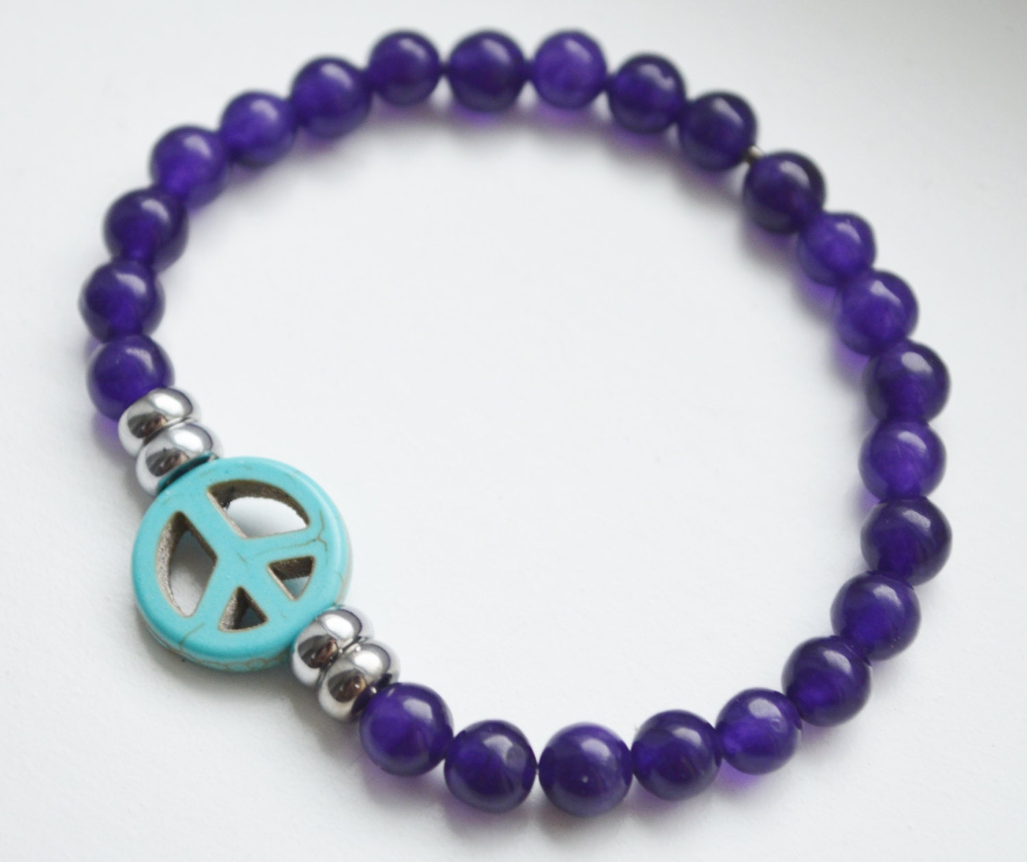 Purple, Turquoise, and Silver Peace sign Bead bracelet