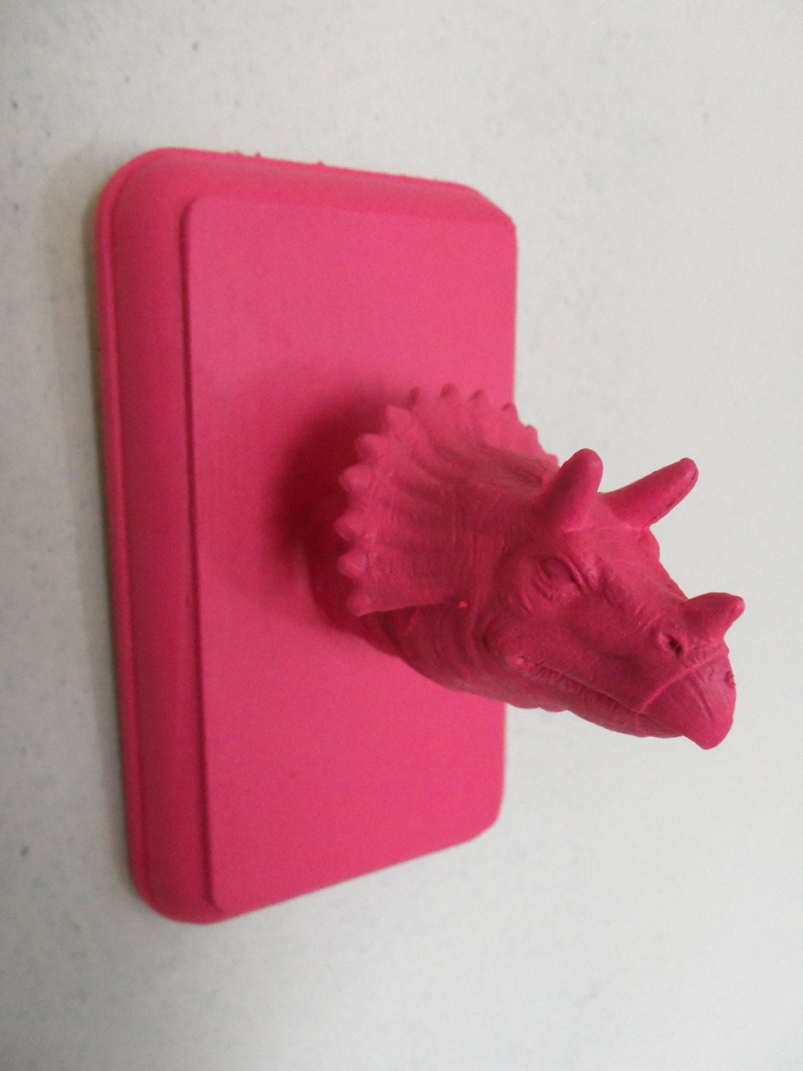 hot pink faux taxidermy triceratops dinosaur