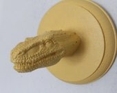 yellow faux taxidermy giganotosaurus dinosaur head