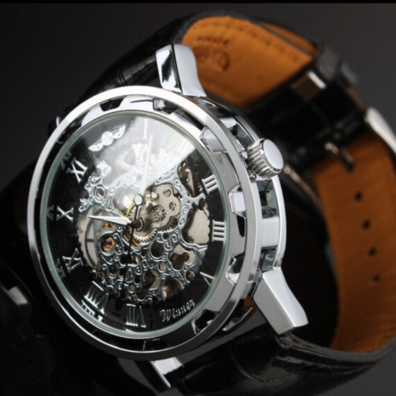 Steampunk Mens gear watch,  Silver with black synthetic leather band.  Very elegant.