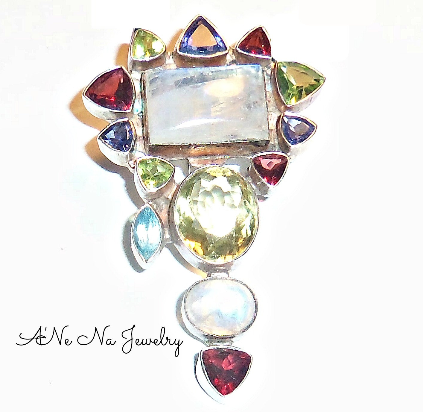 Mufti-Faceted, Multi Gemstone Pendant On Leather Chord ( Rainbow Moonstone, Topaz, Garnet, Peridot and Amethyst)  " Opulent "