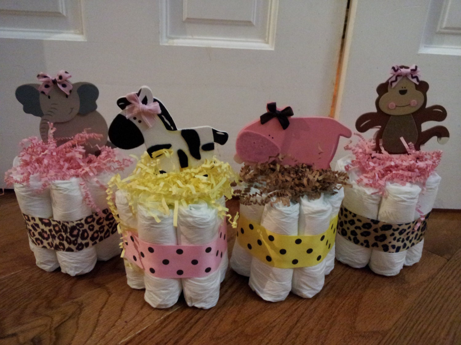4 girl mini diaper cakes, baby shower centerpiece