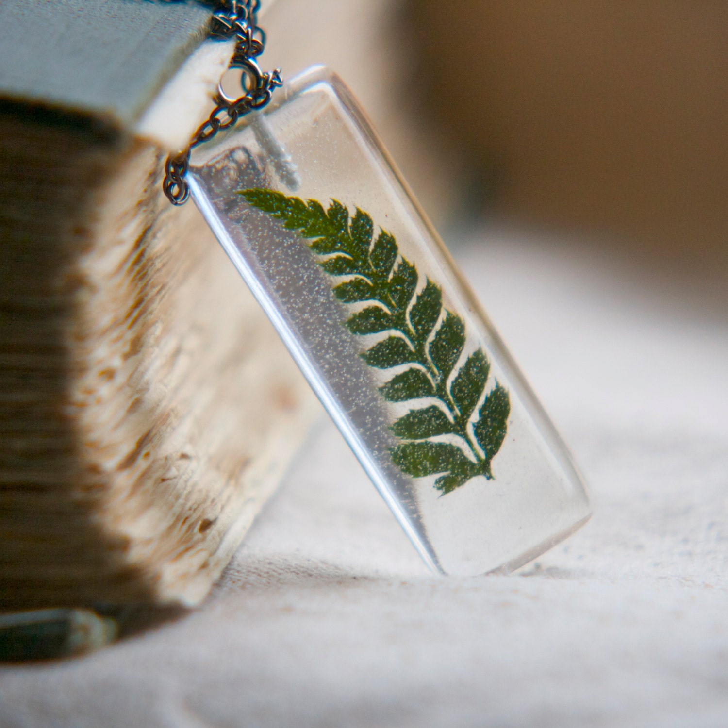 resin jewelry. pressed fern necklace. dried flower. romantic dark love. Rectangle geometry.