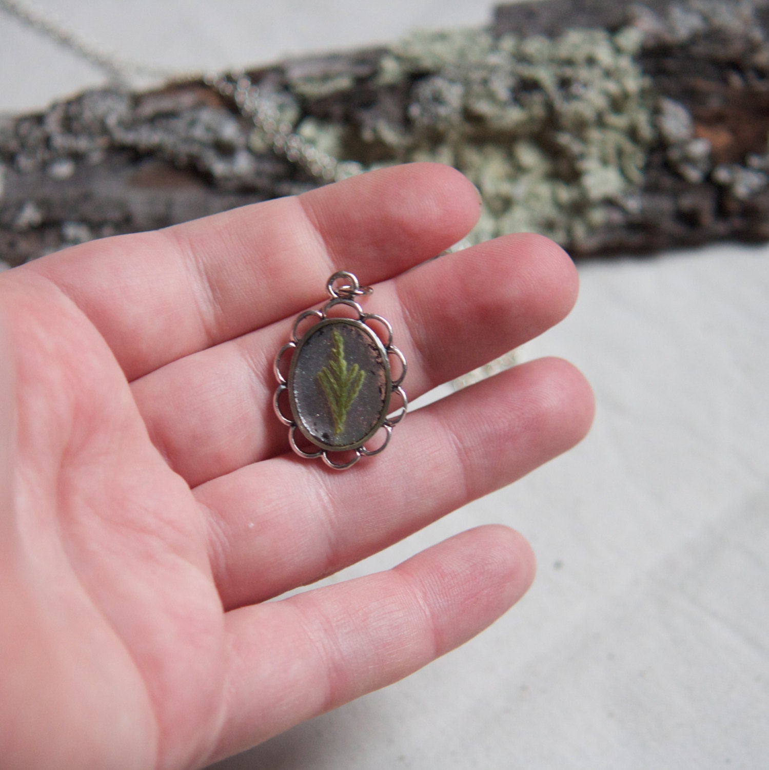 real flower jewelry pressed pine sprig emerald green leaf in resin pendant dainty silver filigree setting. nature. floral.