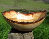 natural edged almond, 1 1/2 to 3" tall, 5 1/2  x 6 1/2" across, only 1/8th of an inch thick
