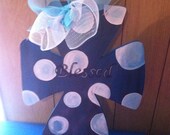 Cross door hanger