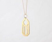 The Cara Necklace - hand-cut brass quartz crystal outline