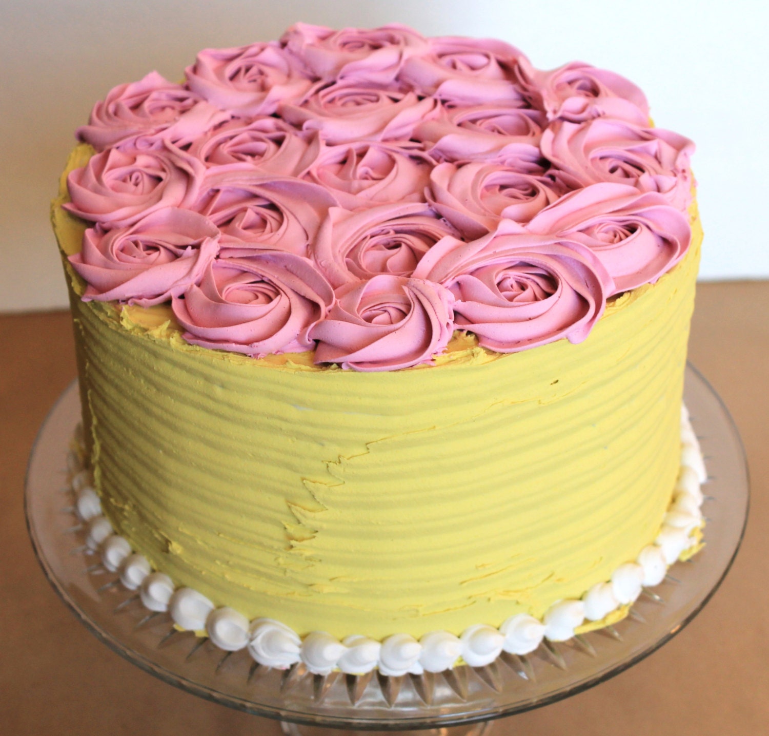Made to order fake cake 8x3, pink rosette topped, yellow and white frosting- Any color, just ask