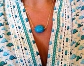 Carly necklace - carved turquoise howlite stone on gold played chain