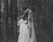 Stunning low lace back wedding dress with silk chiffon body perfect for beach or garden vintage bohemian wedding