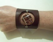 Leather cuff bracelet with wire wrapped bead