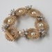 Luxurious gold seed beads bracelet with Swarovski crystal pearls