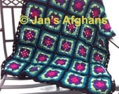 Crocheted afghan art deco granny squares of magenta violet windsor blue grass green and teal with black border READY TO SHIP