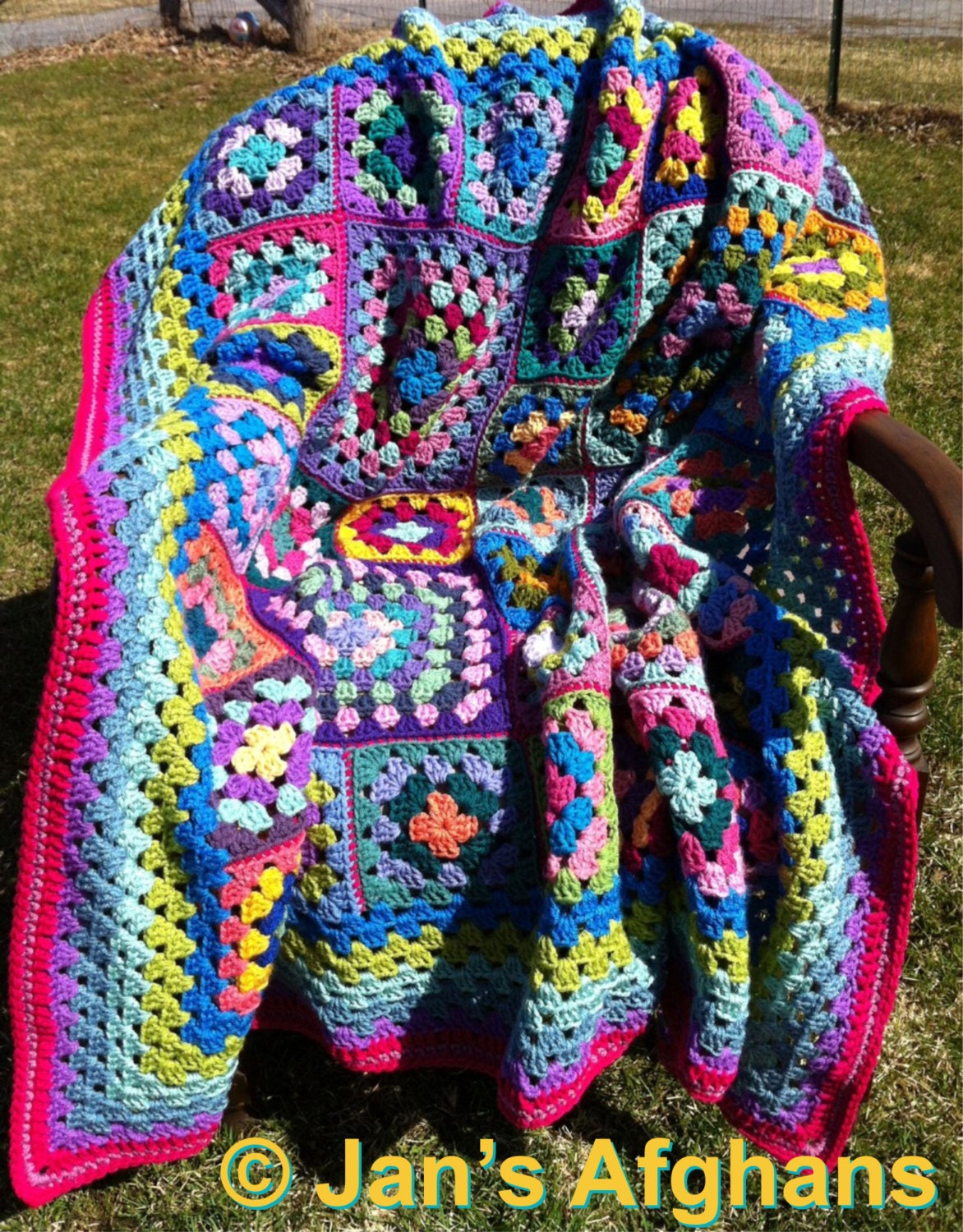 Crocheted afghan kaleidoscope granny square afghan with hot pink (pomegranate) border READY TO SHIP