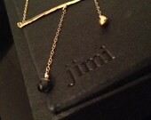 The 'Jen' necklace of solid 14kt yellow gold and blue sapphire