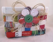 Paper basket with paper flower applique