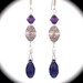Sterling silver earrings with amethyst and Swarovski briolettes and crystals.