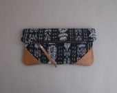 ikat and leather clutch