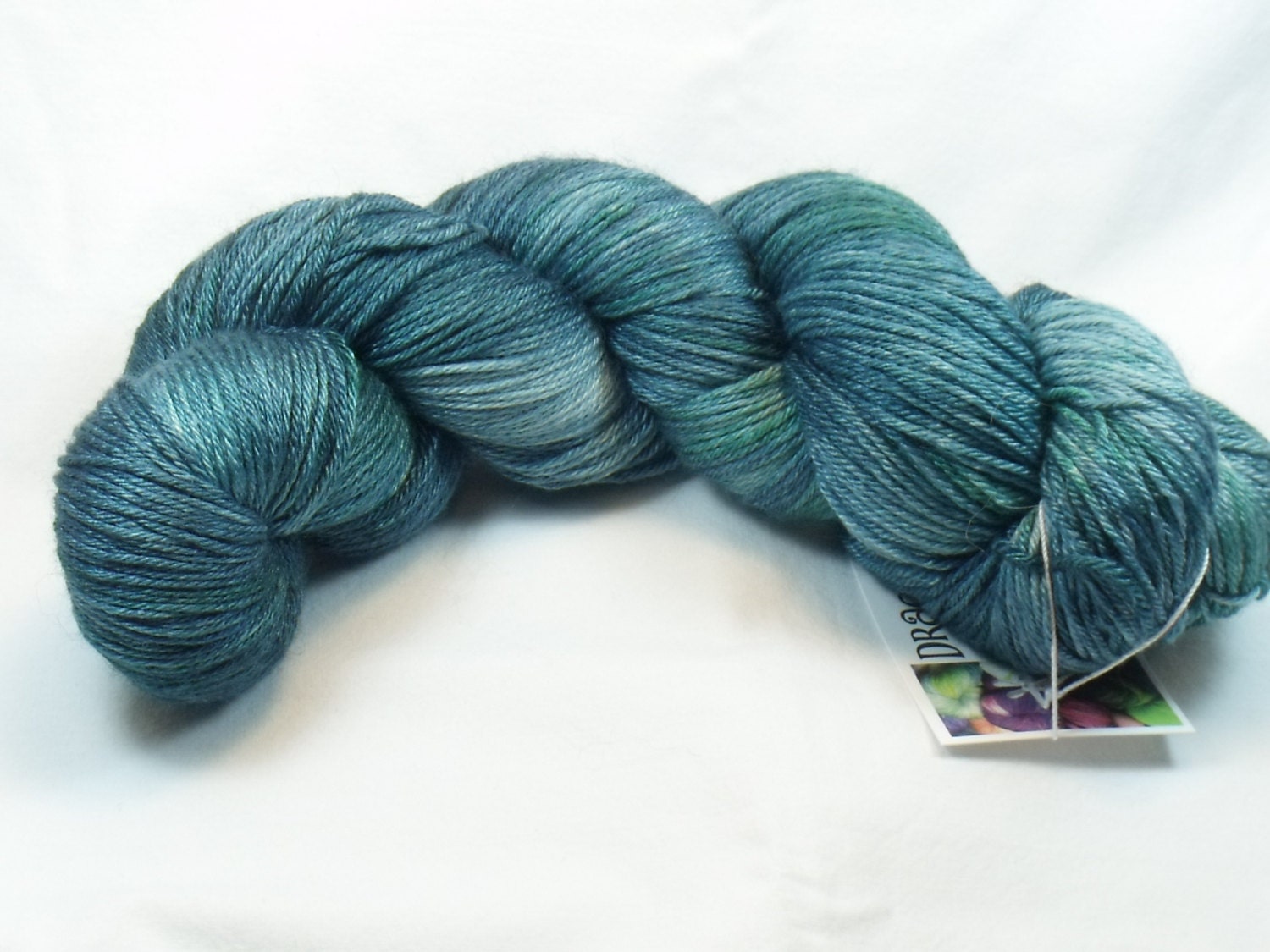 Silk Blend Fingering Yarn Hand Dyed in Delirium