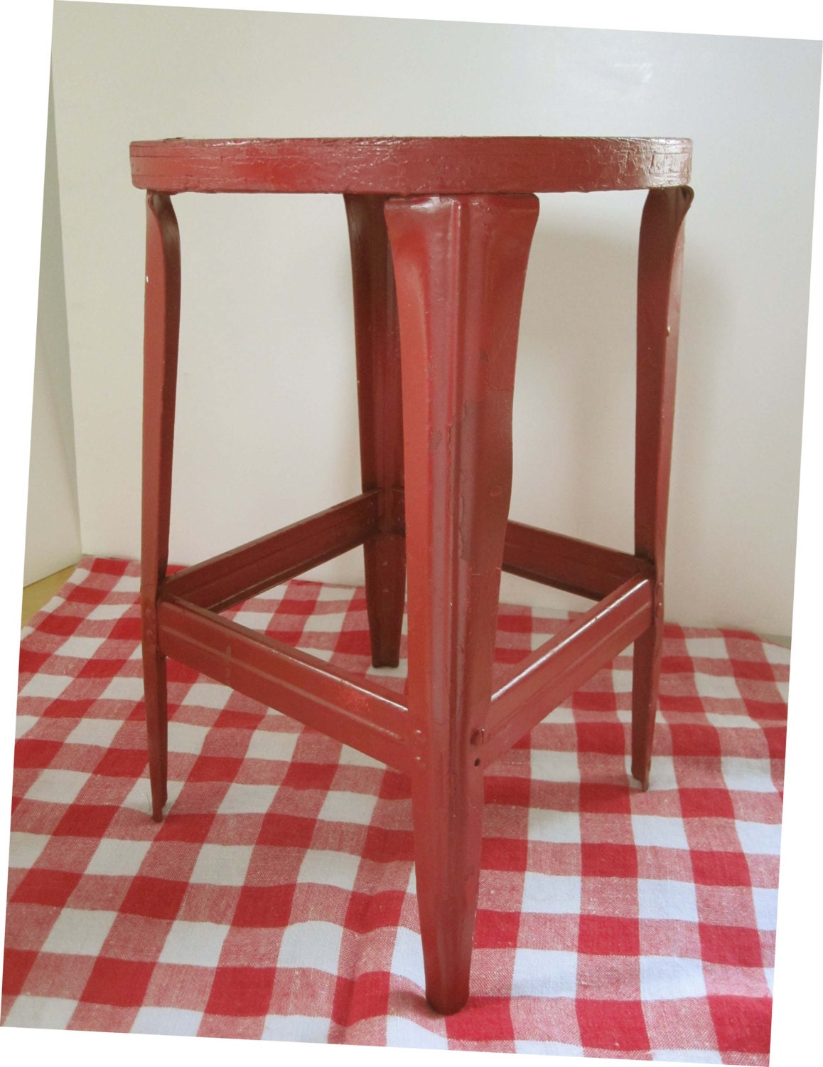 A Deep Red Stool With Wood Top and Metal Base - Cute, Short and Useful - For a Plant - For a Child - For Fun