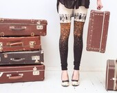 Beige and black rust color block leggings with tribal tiny people print