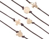 Leather bracelet with gold- pleated cross, heart, round shape, bird or cat