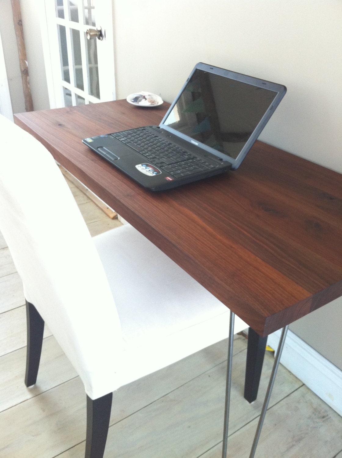 Modern industrial, mid century modern wood & steel desk featuring black walnut top with hairpin legs.