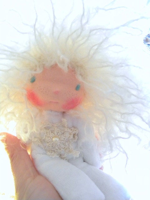 Isodora is a beautiful  7 inches little   Waldorf doll  in a cotton  string bag