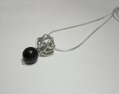 Sterling silver wire cage pendant with stones