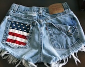 Levis High waisted denim shorts Studded super frayed with American Flag and studs all sizes.