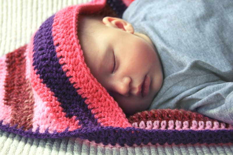 Crocheted hooded striped baby blanket