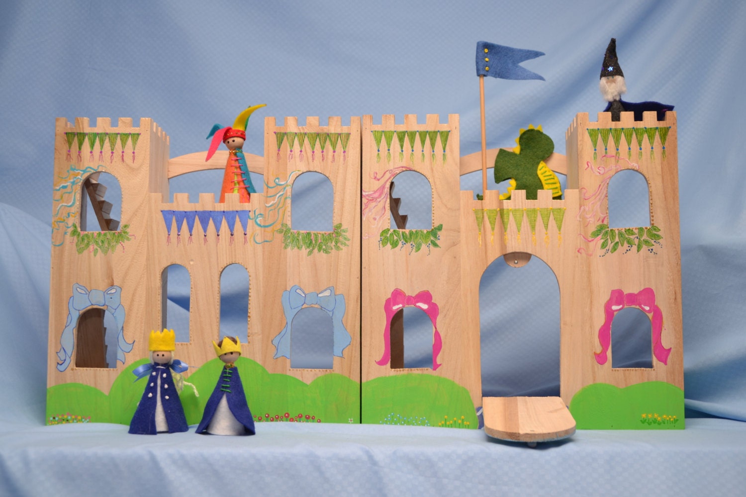 Finger puppets with wooden castle theaters hand-painted by Pamela Frame