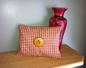 gingham styled cedar accent pillow with custom leather button
