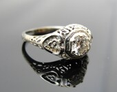 18k White Gold Art Deco Filigree Engagement Ring with Hearts and Flowers, Lovely Diamond. RGDIA779D