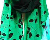 Hand painted green silk scarf. Black list on elegant shawl. Made in Europe.Handmade scarf.