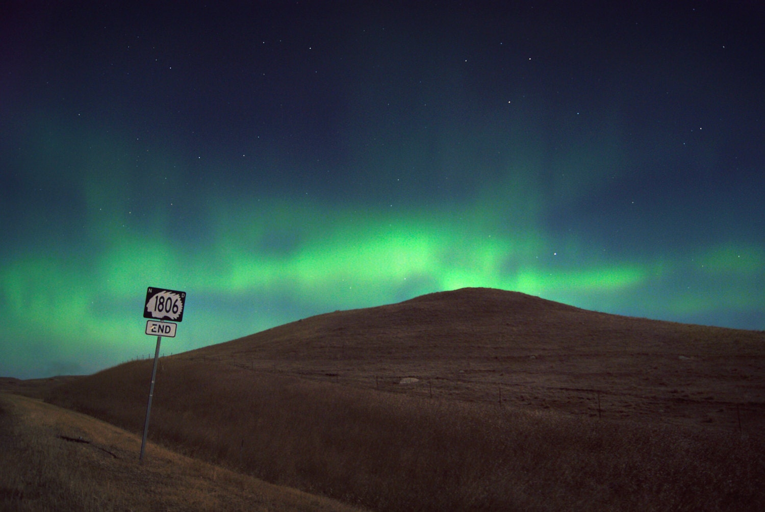 8x12 - Northern Light at the end of HWY 1806