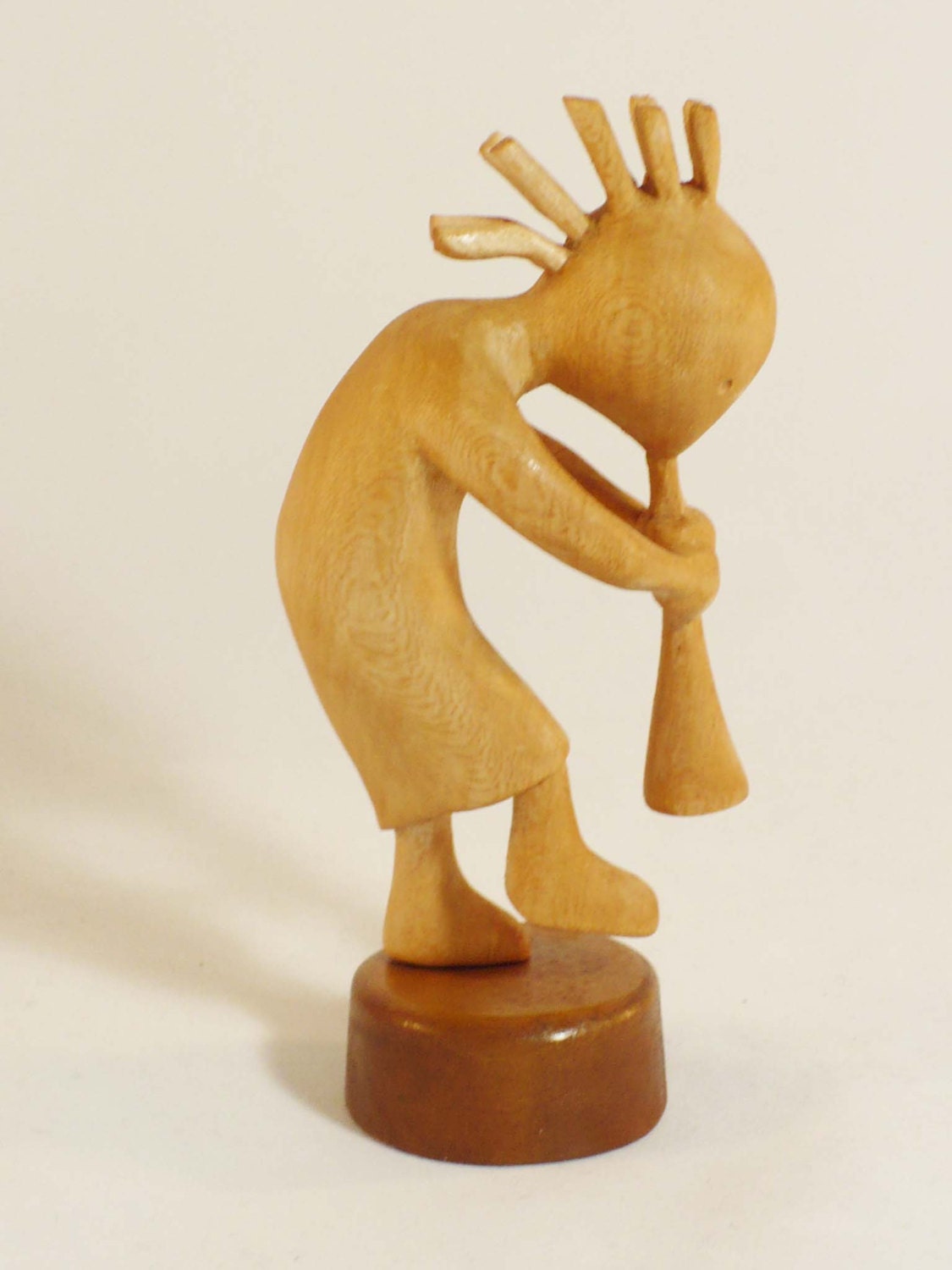 Wood Carving of kokopelli mythic fantasy art sculpture