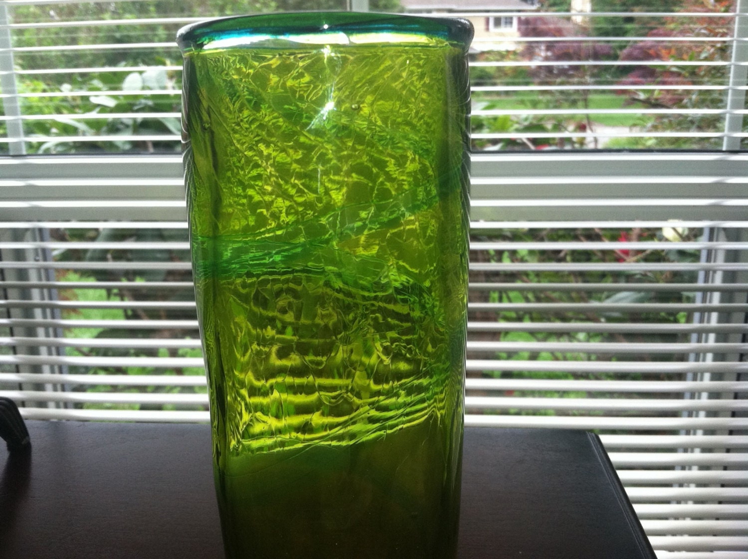 Hand blown spring green vase with green spiral