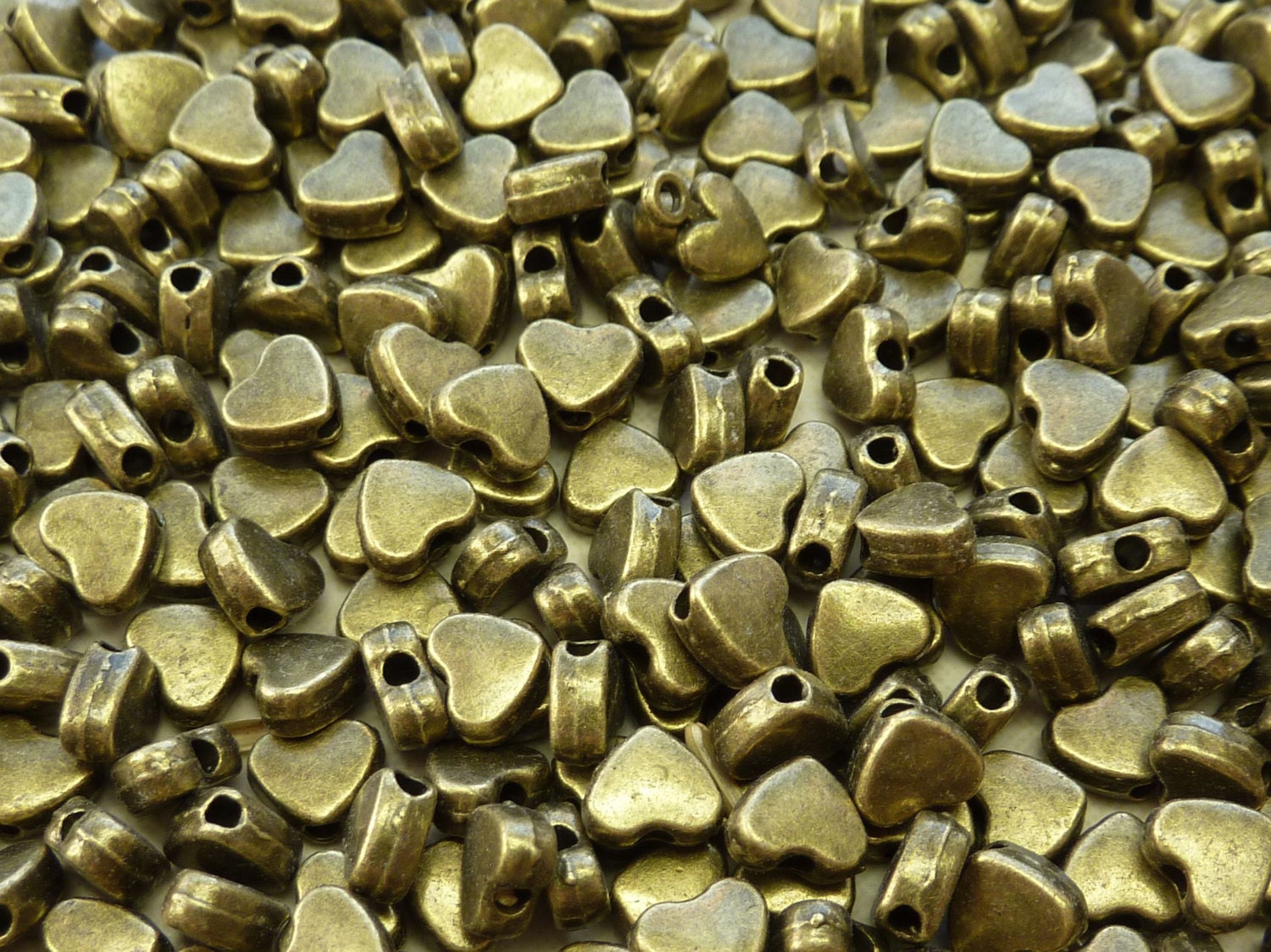 6x5mm (1.5mm hole) Antique Brass Base Metal Heart Spacer Beads - Qty 20