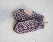 Handknitted wool mittens for babies, norwegian pattern