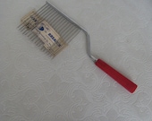 Vintage Red Bakelite Cake Breaker by H & P House Furnishing