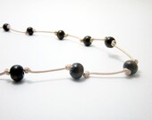 Brown Wood Necklace in a Gold Tone Cord