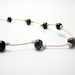 Brown Wood Necklace in a Gold Tone Cord