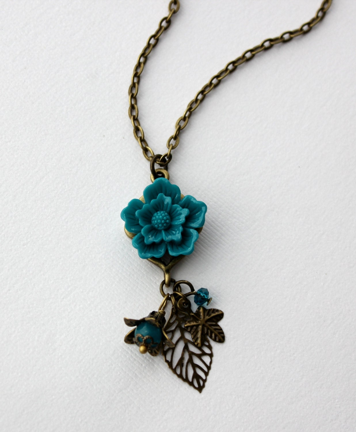 Teal Sakura Flower and Leaf Charm Necklace in Antique Brass