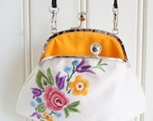 Flowery summer clutch made from vintage hand-embroidered tablecloth