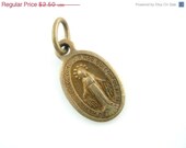 On Sale 25% Off Vintage Latin Miraculous Medal - Brass Catholic Charm - MM59