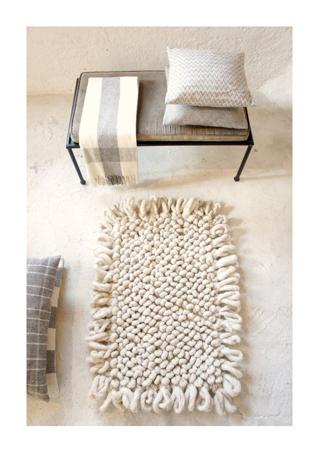 P A L O M I T A   hand-loomed wool bouclé area rug in  C R E A M