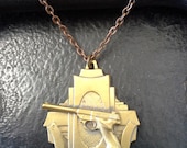 1970's Sharpshooter Medal Gun Necklace