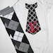 Baby Boy Tie Bodysuit with Initial in Black and White PLUS Argyle Leg Warmers
